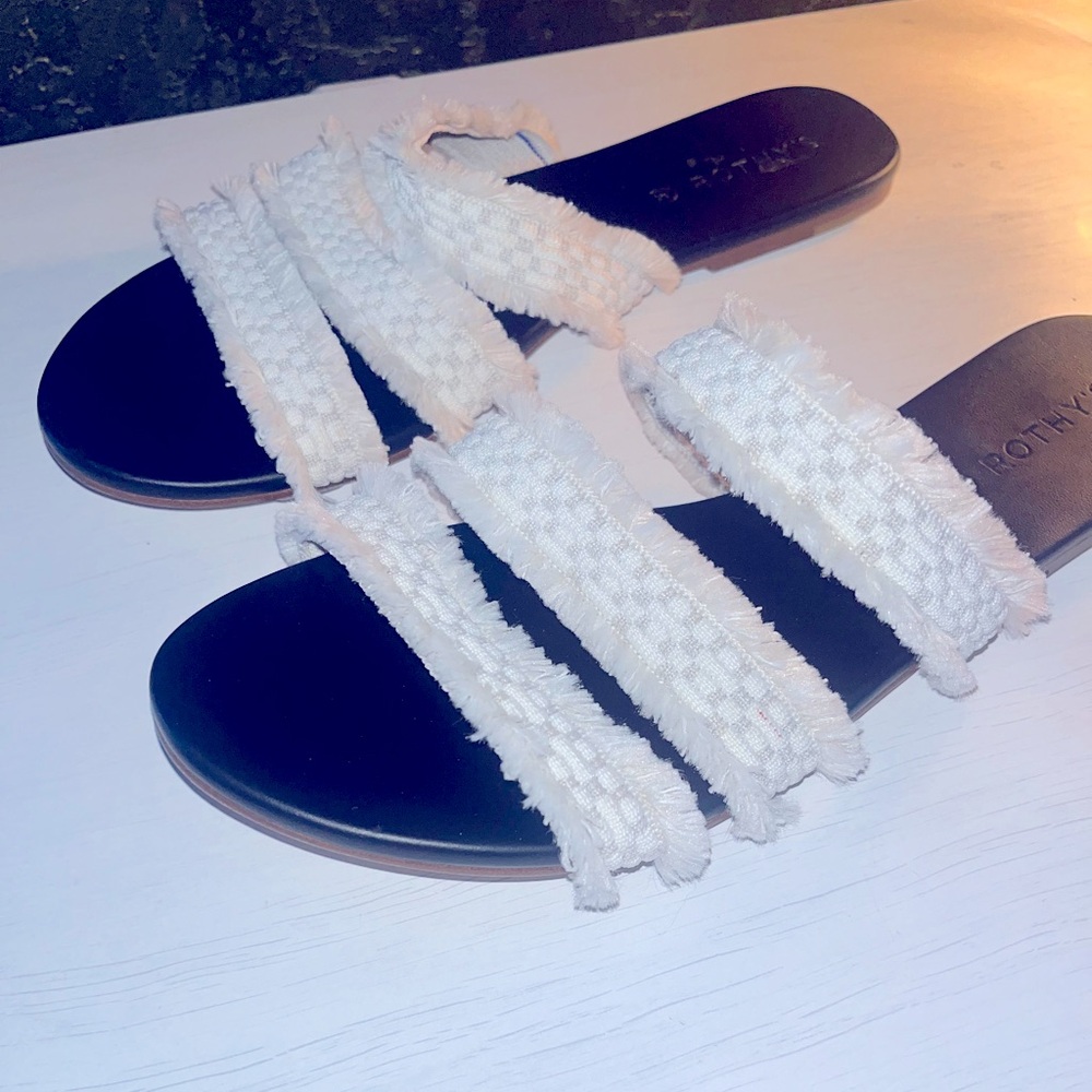 Rothy’s seashell fringe sandals